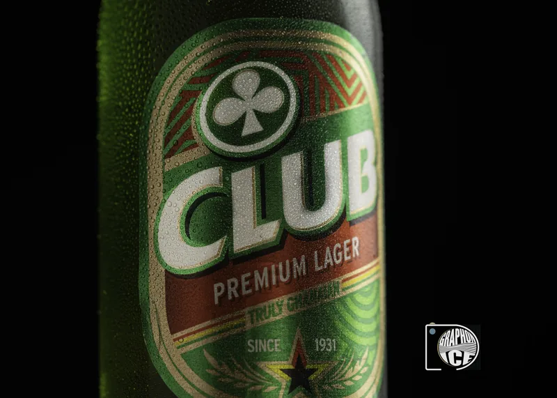 Cold lager bottle with water droplets on a dark background